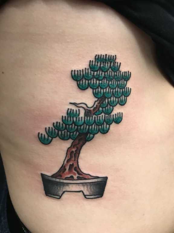 bonsai tree tattoo on side 
